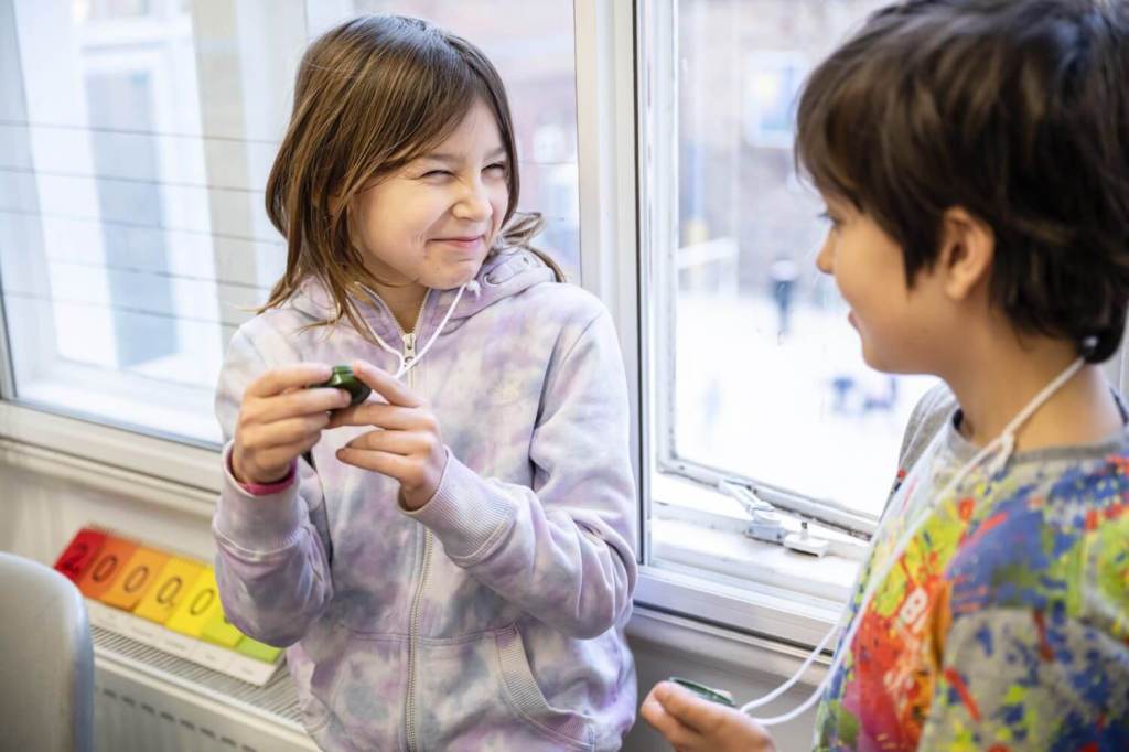 Two students finding something amusing in a lesson